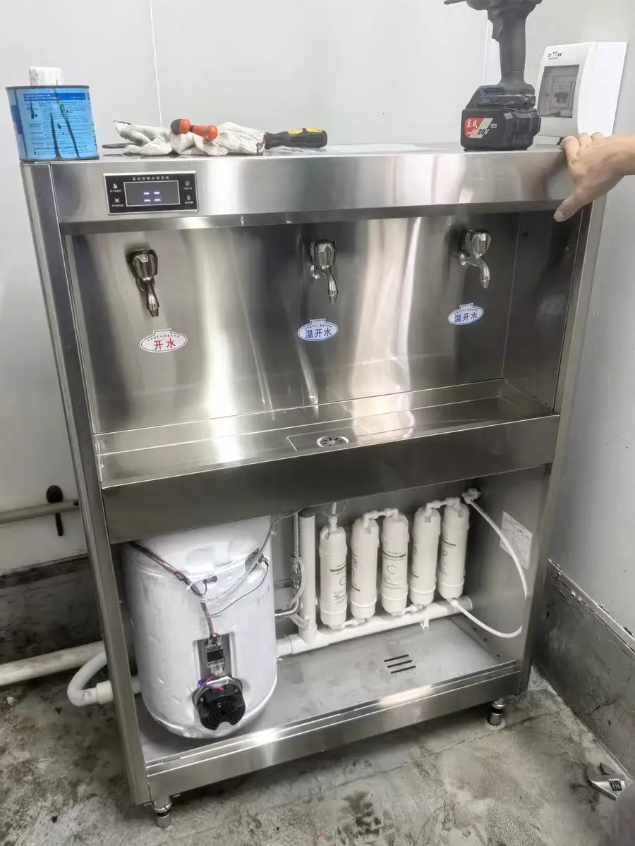 Vereaqua hot water dispenser filter cartridge installation on-site.